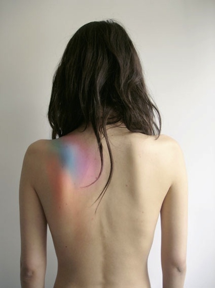 long brown hair, rainbow colors, shoulder tattoo, watercolor feather tattoo, white background