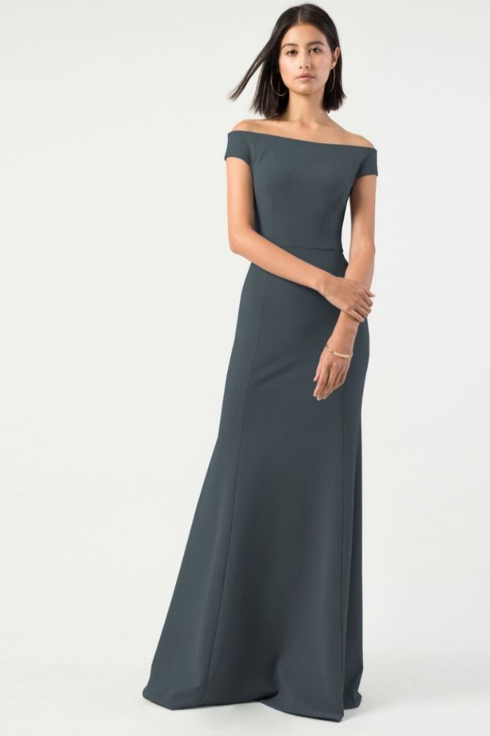 dark grey dress, off the shoulder neckline, short black hair, white background, petite mother of the bride dresses