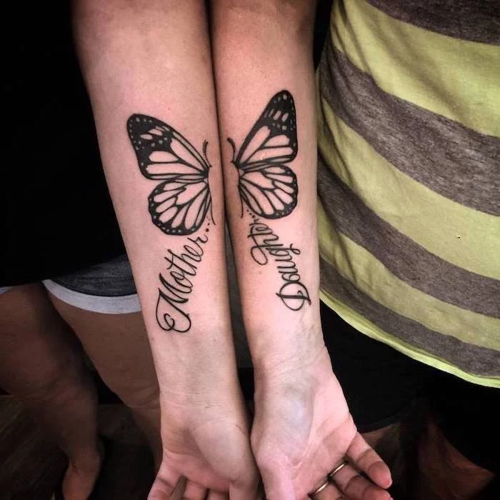 two halves of a butterfly, matching mom and daughter tattoos, forearm tattoos