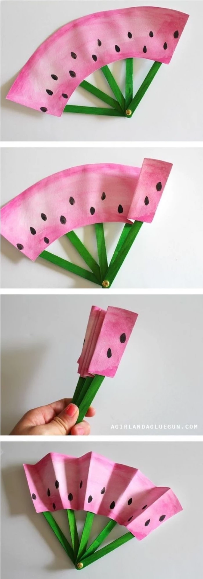 cool diy projects, paper fan, painted as a watermelon, wooden popsicle sticks