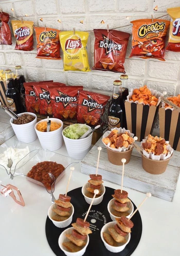 nachos bar, themes for parties, make your own nachos, salsa and guacamole, sour cream and cheese