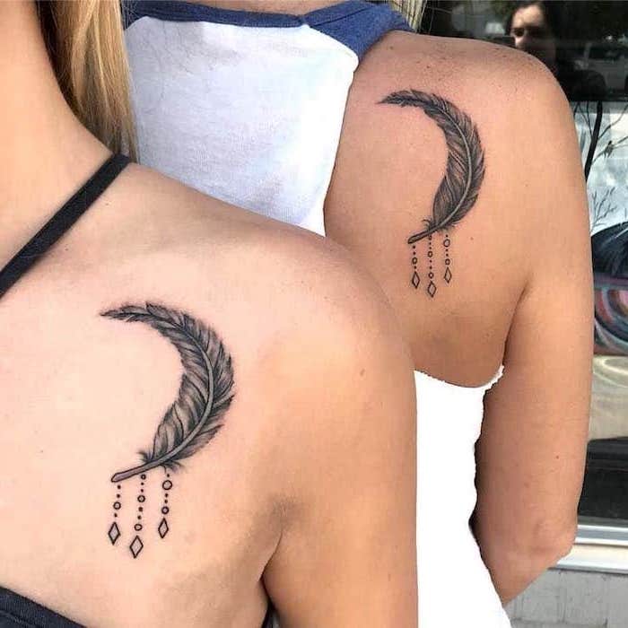 crescent moon, made of a feather, mother and daughter tattoos, shoulder tattoos