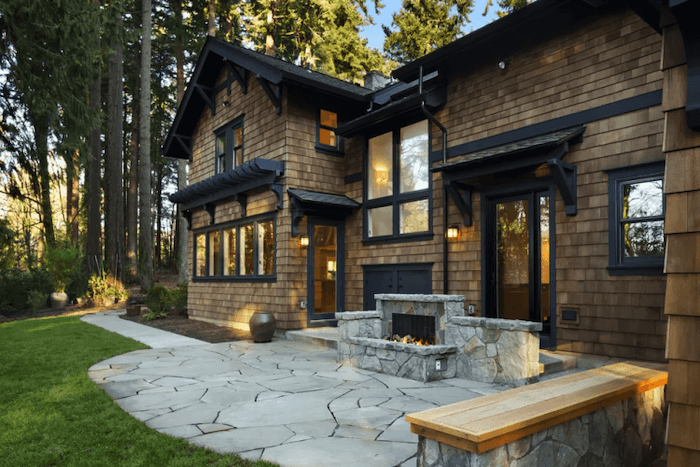 stone tiled floor and pathway, stone fireplace, wooden bench, front porch designs