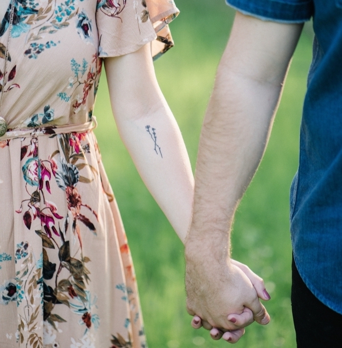 flowers forearm tattoo, couple holding hands, cute little tattoos, floral dress, denim shirt