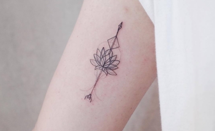 tattoo locations, geometrical lotus flower, inside arm tattoo, white shirt