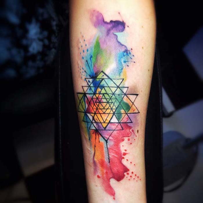 geometrical design, watercolor forearm tattoo, small colorful tattoos