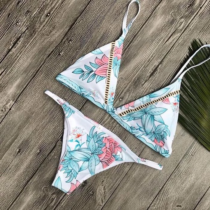 two piece, floral print, cute bathing suits for girls, wooden background, palm leaf