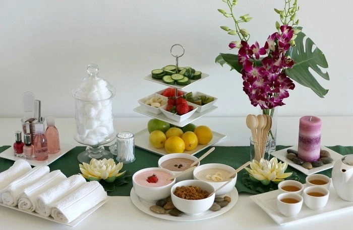spa theme, fruits and vegetables, folded towels, party theme ideas, oatmeal in white bowls