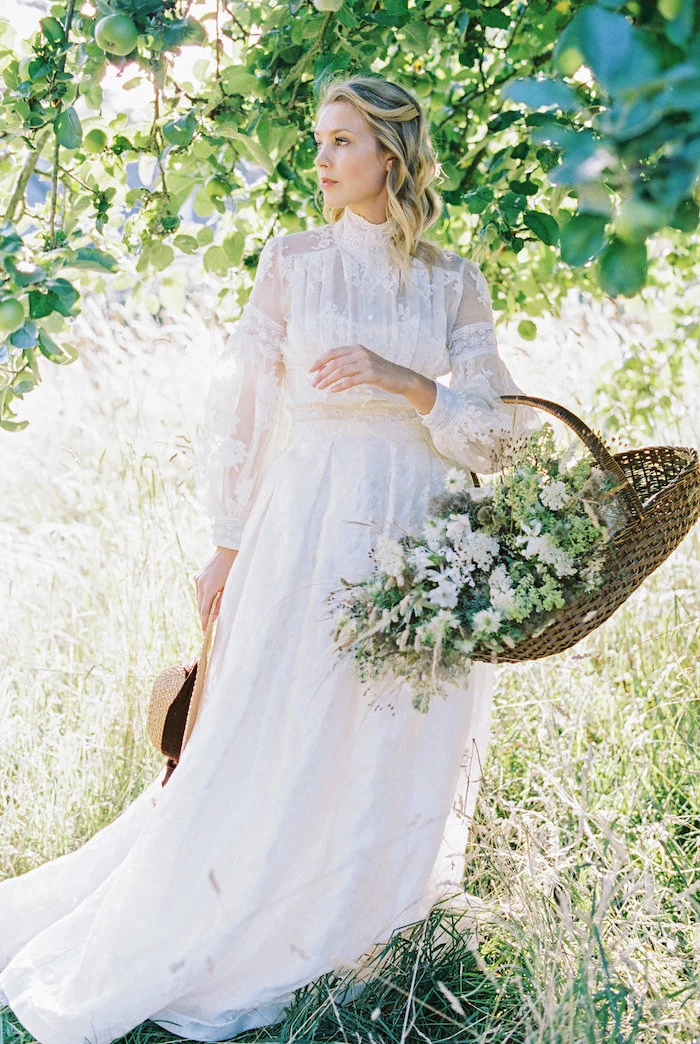 wooden basket, with white flowers inside, high neck, lace dress, blonde wavy hair, wedding dresses with long trains