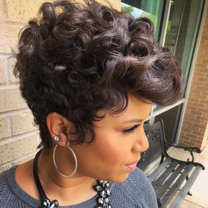 black hair, short curly hairstyles for black women, hoop earrings, grey sweater