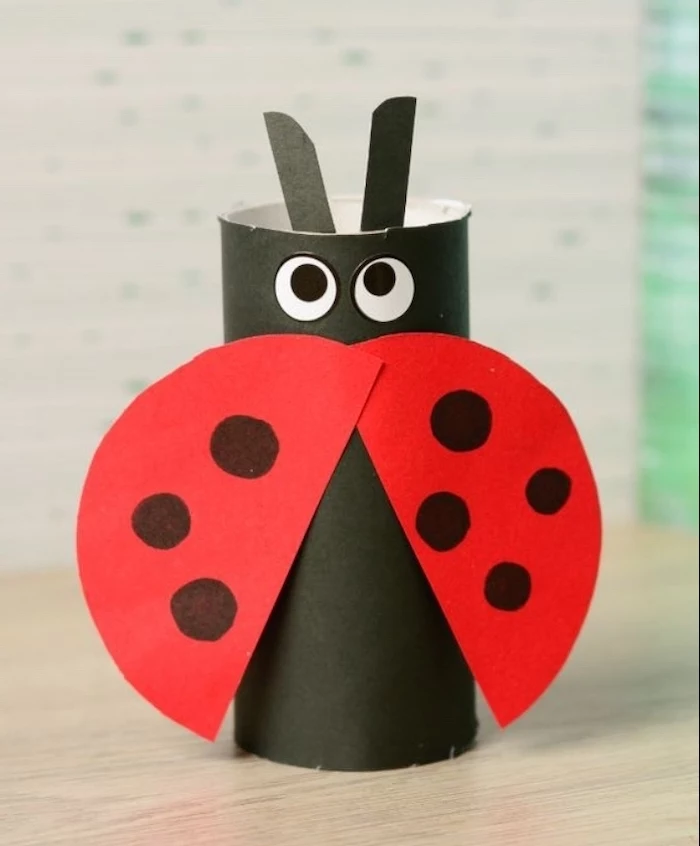 carton lady bug, made from toilet paper roll, creative things to do when bored, wooden table