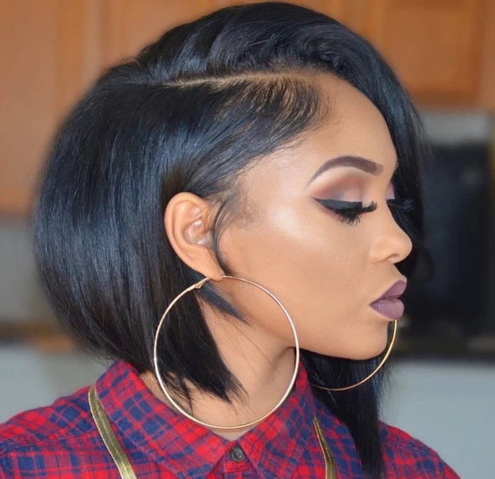 bob hairstyles for black women, black hair, large hoop earrings, purple lipstick, plaid red shirt