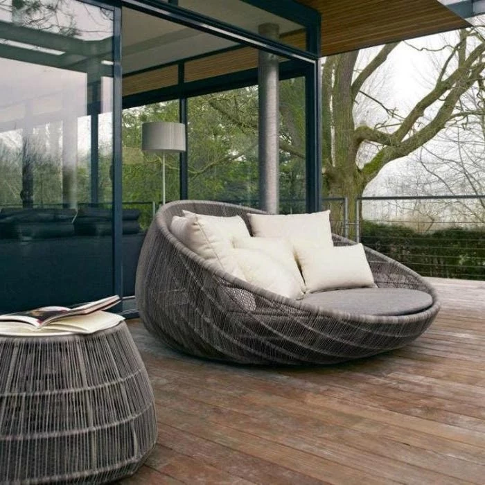large armchair, grey cushions, white throw pillows, front door decor ideas, wooden ottoman
