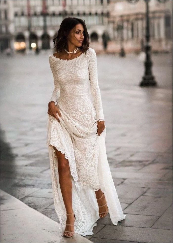 black wavy hair, lace dress, form fitting wedding dresses, nude sandals