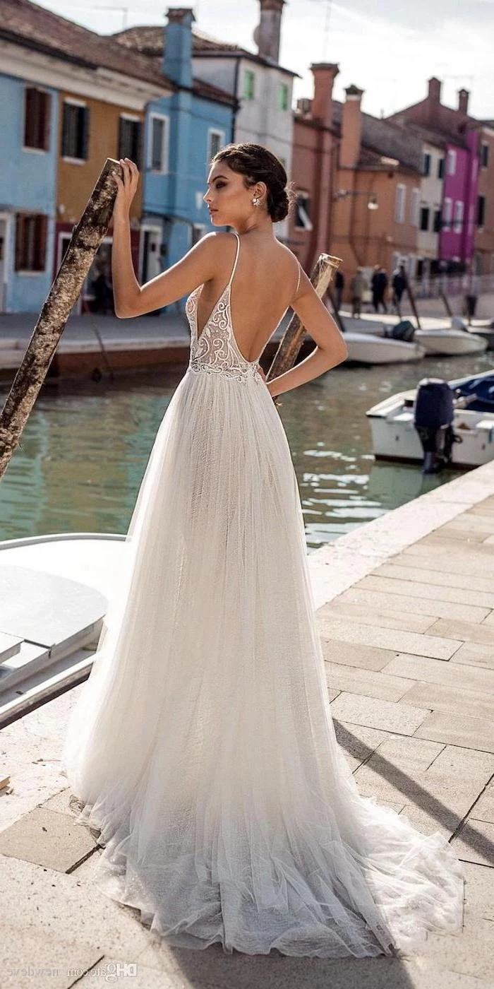 long tulle dress, open back, short beach wedding dresses, brown hair, in a low updo
