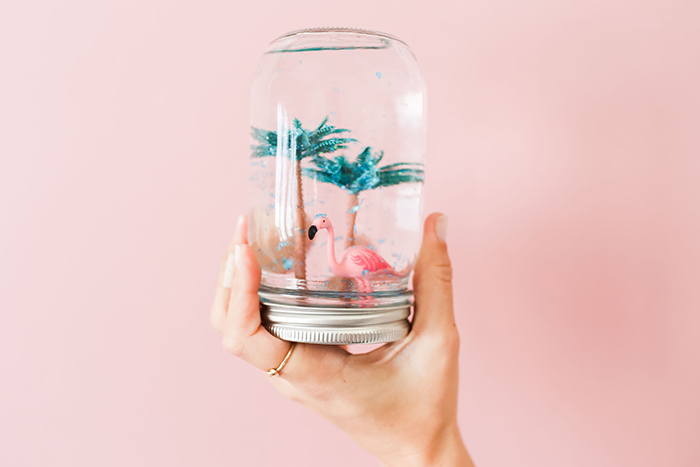 pink background, diys for kids, mason jar, filled with water, two palm trees, pink flamingo
