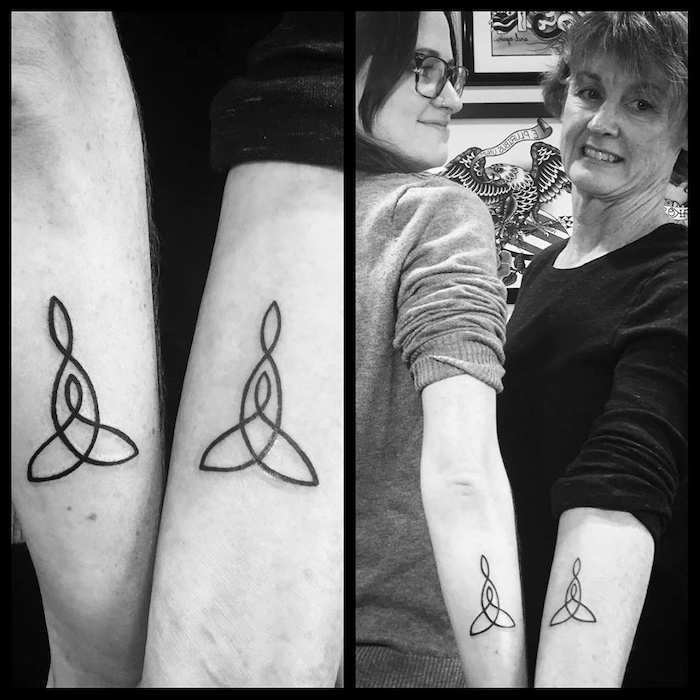 celtic symbols, back of arm and forearm tattoos, daughter tattoos, black and white photo
