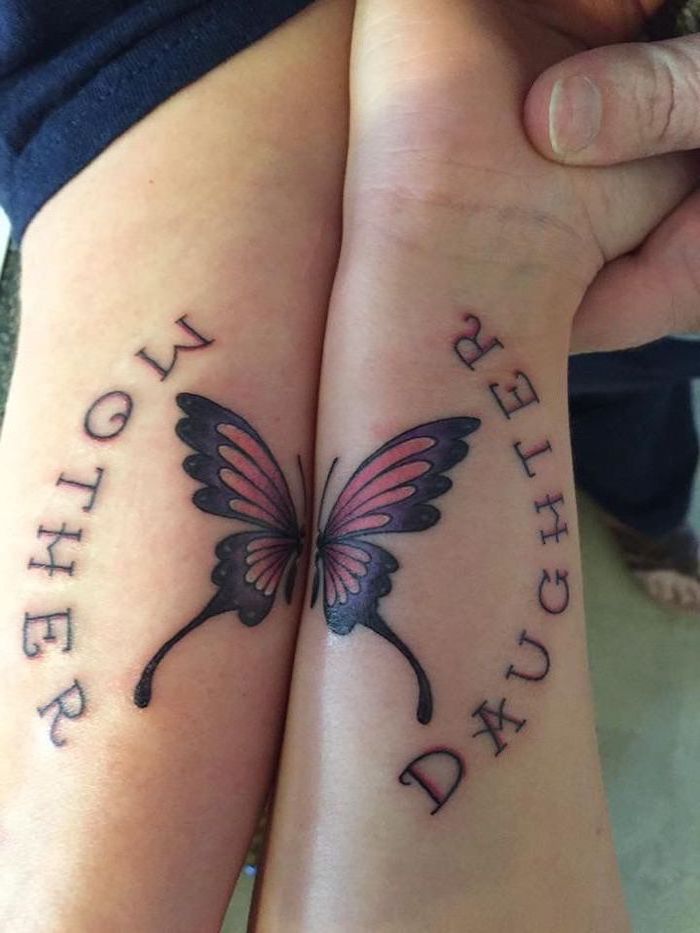 mother daughter infinity tattoos, halves of a butterfly, forearm tattoos