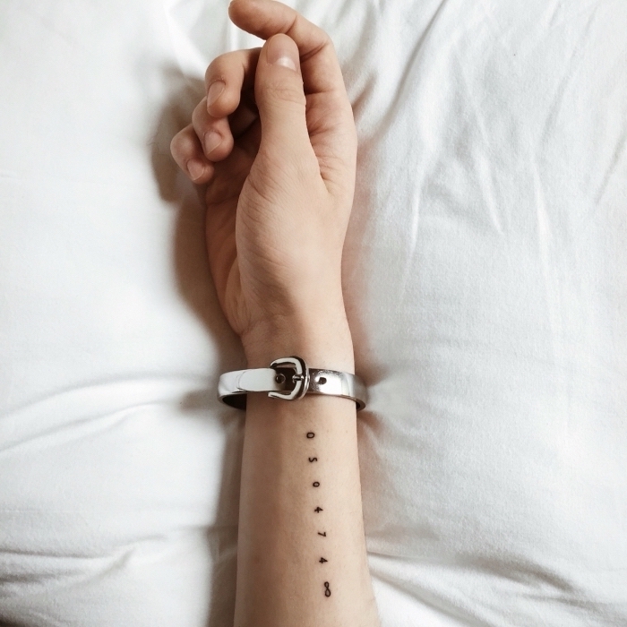 wrist tattoo, numbers and infinity symbol, cute simple tattoos, silver leather, watch strap, white background