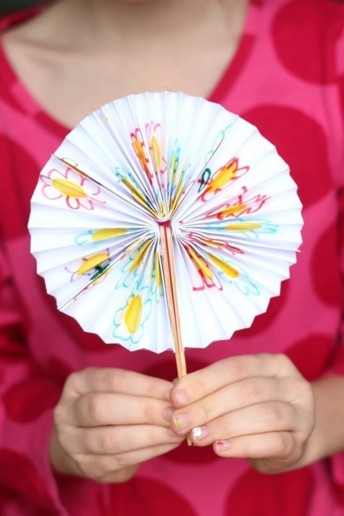 paper fan, step by step, diy tutorial, diys for teens, pleated paper, pink blouse