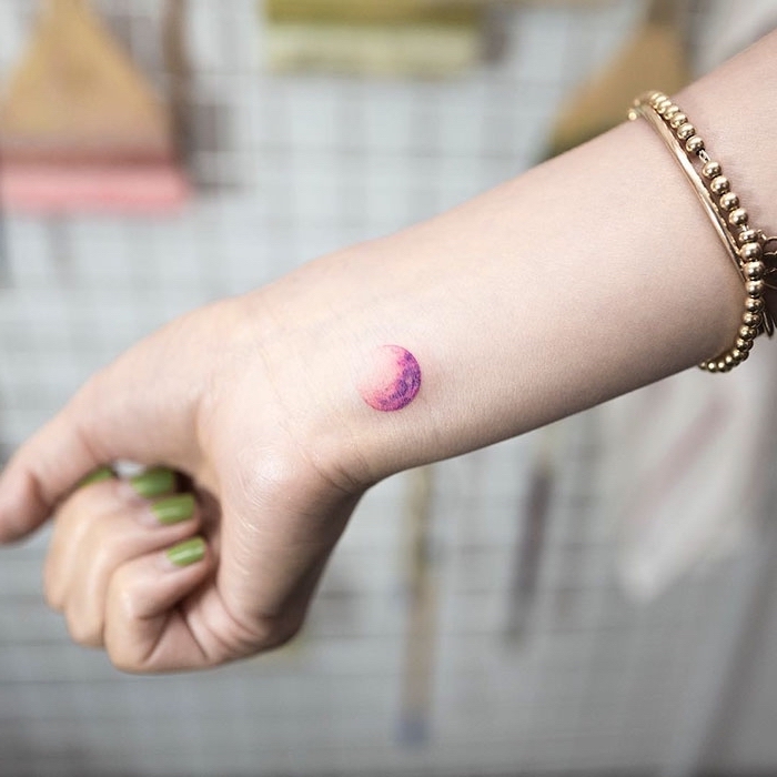 pink moon, wrist tattoo, minimalistic tattoos, green nail polish, gold bracelets
