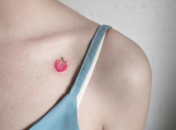pink peach, collarbone tattoo, minimalistic tattoos, blue top, white background