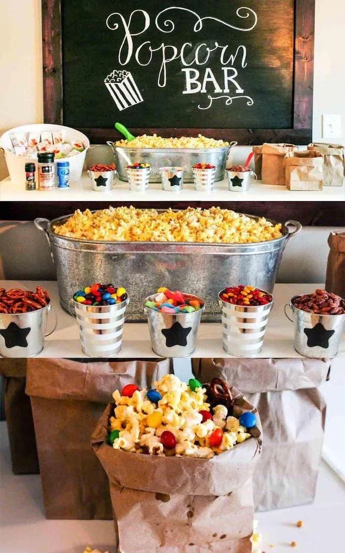 popcorn bar, large tub of popcorn, 16th birthday party ideas, metal cups, full of different toppings
