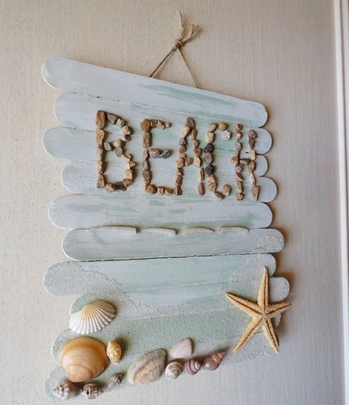 blue wooden popsicle sticks, hanging wall decoration, diy projects for teens, seashells and rocks