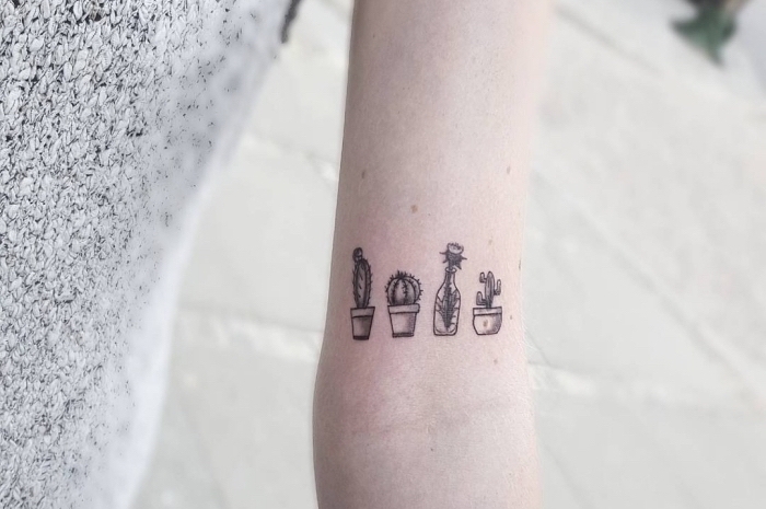 potted cactuses, inside arm tattoo, white sweater, minimalistic tattoos, tiled floor