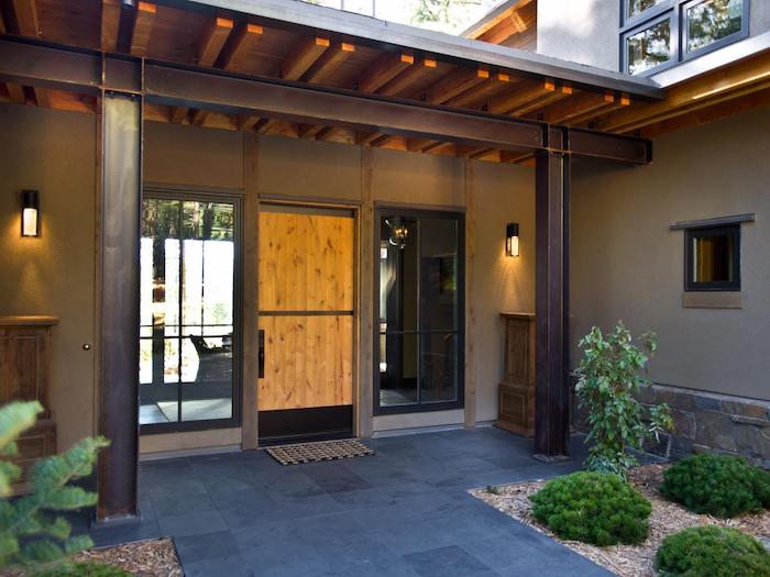 tiled pathway, green bushes, in the gravel, covered porch ideas, metal columns, tall windows