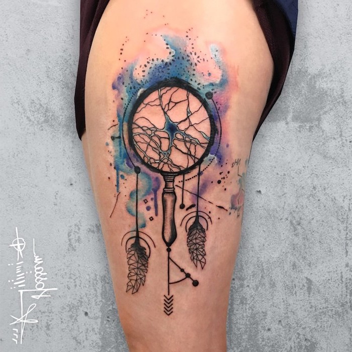 watercolor dreamcatcher, thigh tattoo, delicate female tattoo, grey background, black shorts