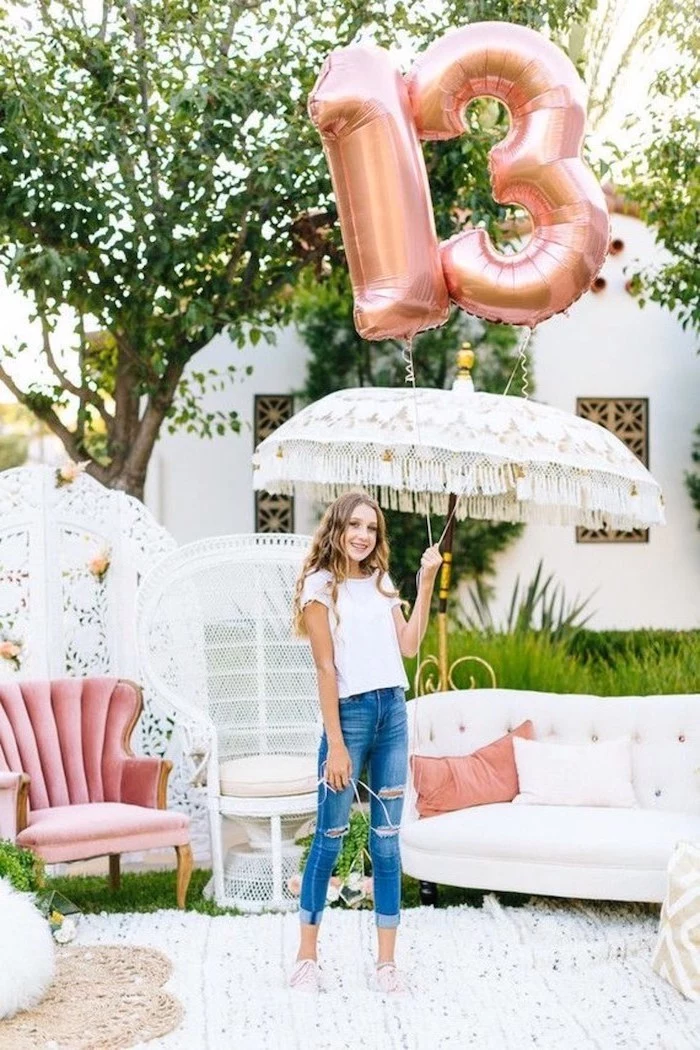 rose gold balloons, number thirteen, good places to have a birthday party, girl holding an umbrella, pink armchair