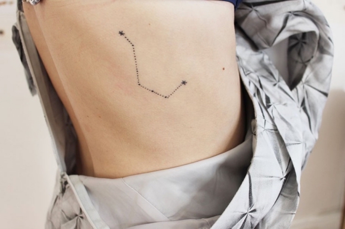 stars and constellation, rib cage tattoo, tiny tattoos, grey dress