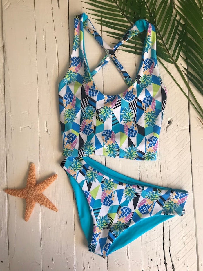two piece, colourful pineapple print, cute swimsuits for girls, wooden background, palm leaves