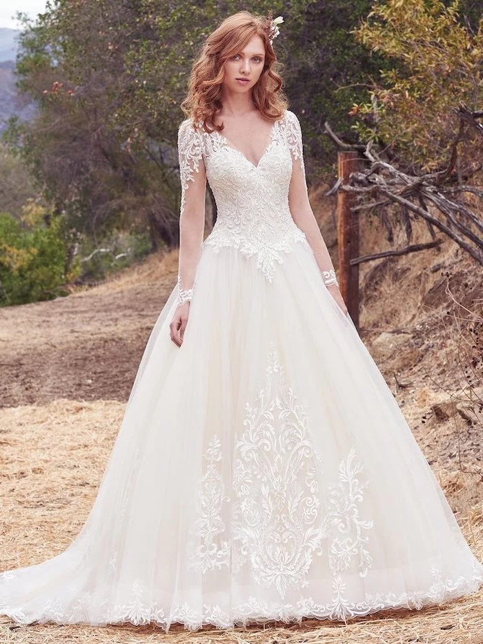 ginger wavy hair, gowns with sleeves, made of tulle and lace, v neckline, forest landscape