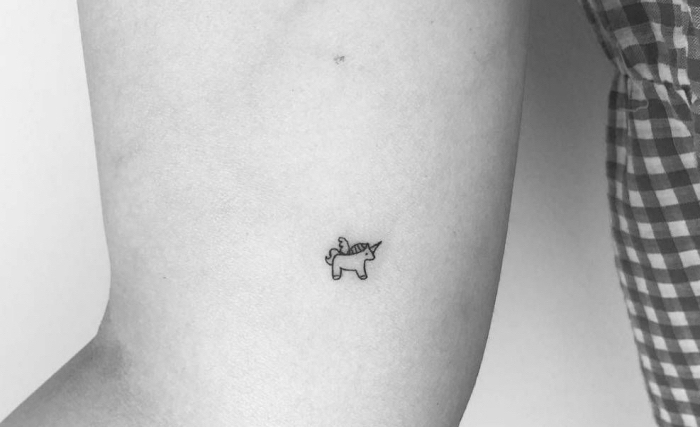 unicorn tattoo, inside arm tattoo, small hip tattoos, black and white photo