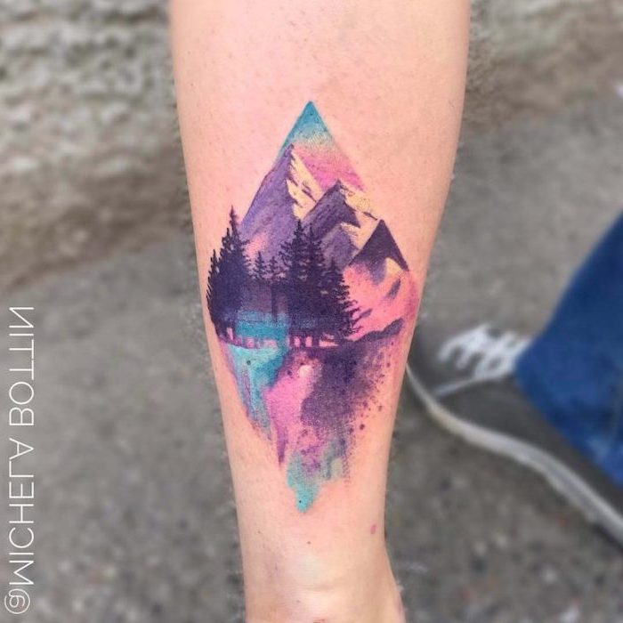 mens hip tattoos, mountain landscape, back of leg tattoo