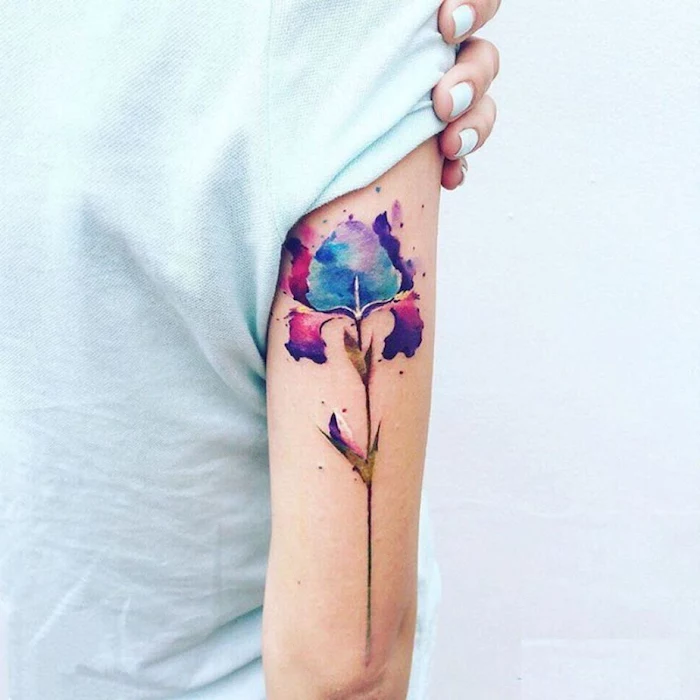 back of arm tattoo, white shirt, mens hip tattoos, watercolour flower
