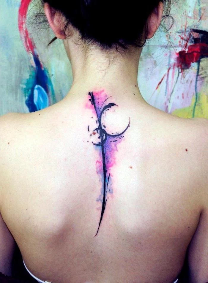 watercolour tattoo, along the spine, black hair, mens hip tattoos