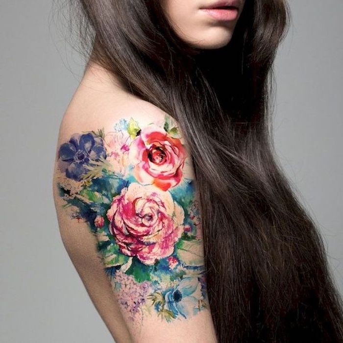 colorful flowers, shoulder tattoo, mens hip tattoos, long brown hair, grey background