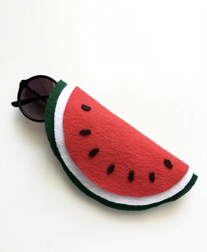 things to do when bored for kids, black sunglasses, inside a case, made of felt, in the shape of a watermelon