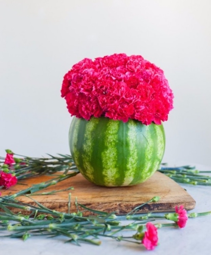 watermelon vase, things to do when bored for kids, pink carnations, flower bouquet, wooden board