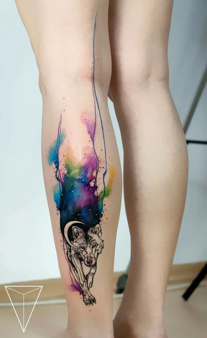back of leg, watercolor butterfly tattoo, wolf walking