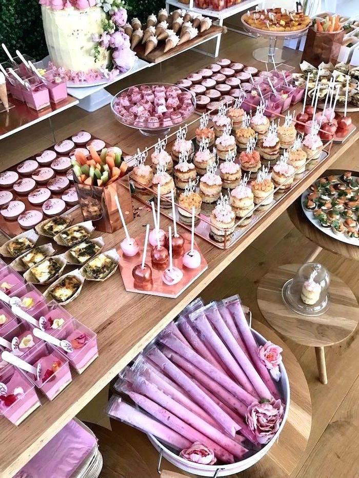 pink sweets, wooden table, birthday party ideas for boys, cake pops and cupcakes, cookies and cake
