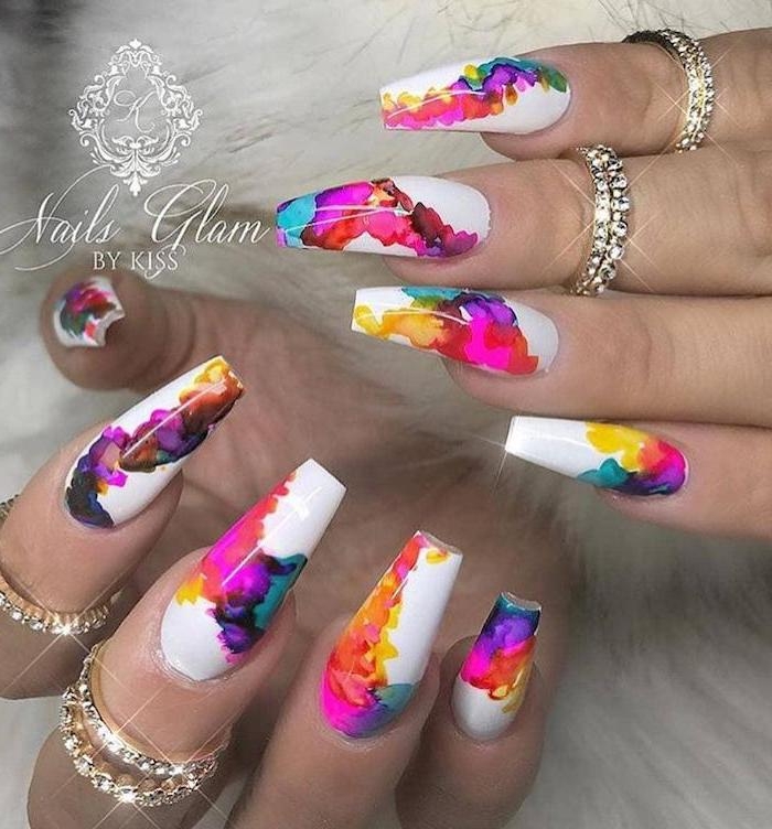 white nail polish, long coffin nails, watercolor nails, gold rings, matte nail designs, white background