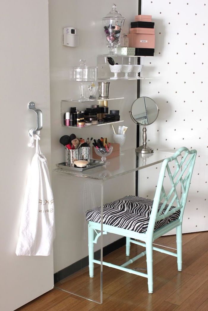 makeup vanity with lights, acrylic table and shelves, turquoise chair, zebra printed cushion