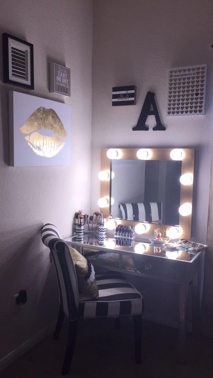white walls, mirror with lights, diy makeup vanity, black and white striped chair, mirrored countertop