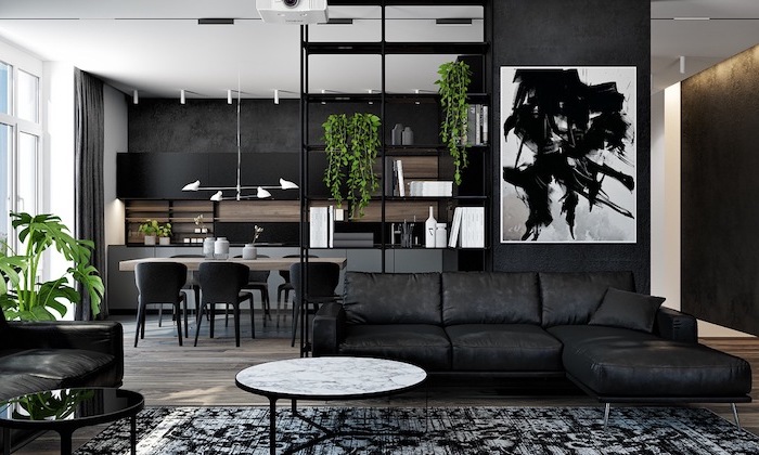 black leather corner sofa, black bookshelf, abstract art, round table, room divider ideas, black and white carpet
