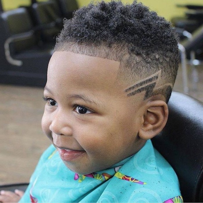 little boy haircuts, black curly hair, fade with a line up, blue cover