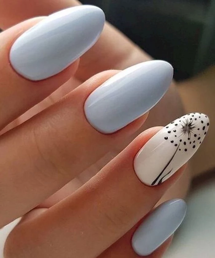 light blue nail polish, black dandelion seeds, almond nails, cute summer nails